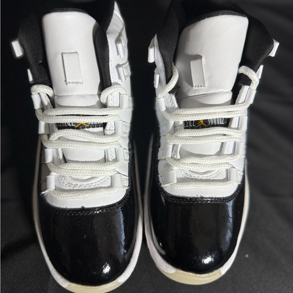 Jordan Retro 11  Black and White Athletic Shoes
